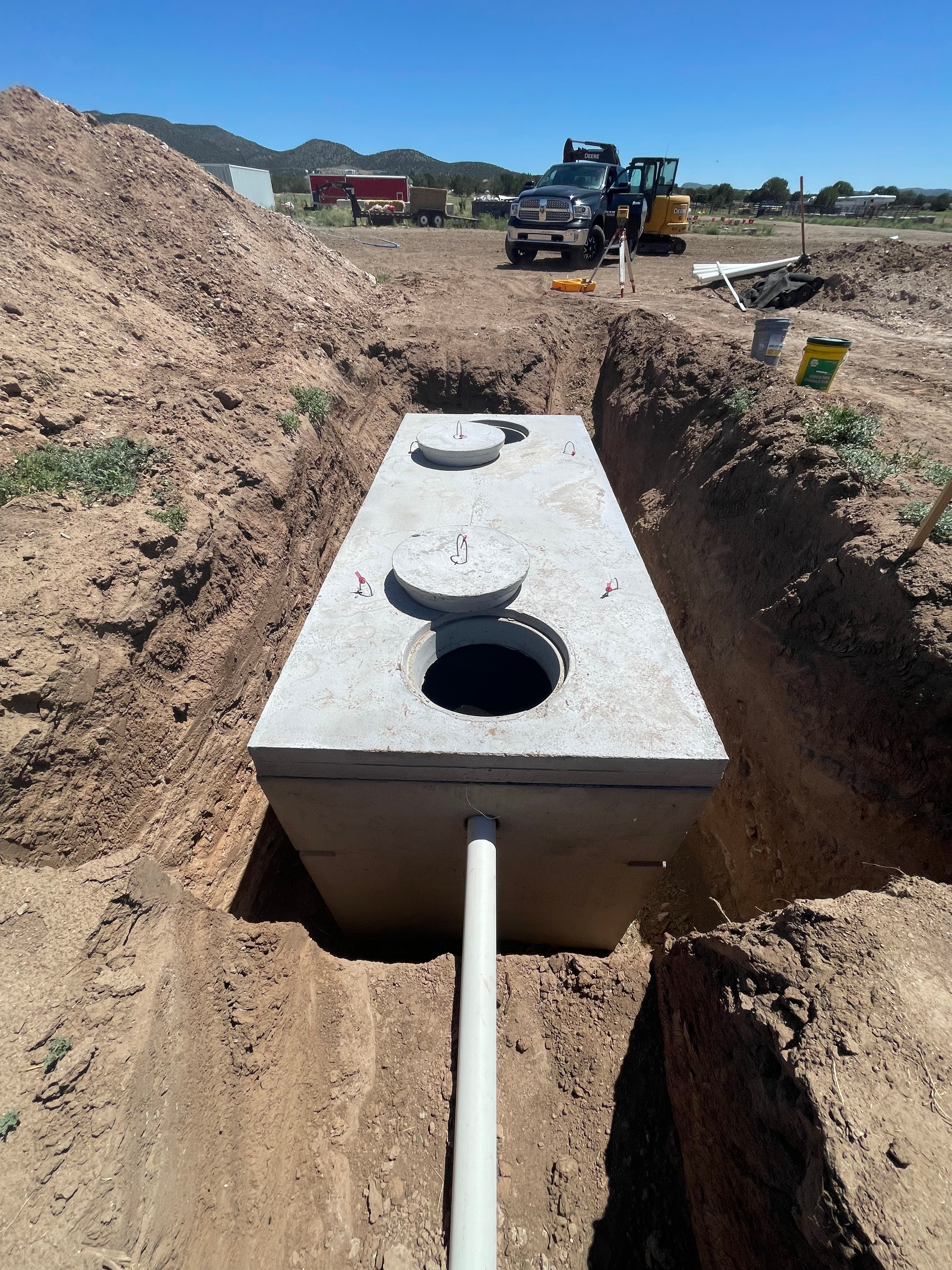 Septic tank installation on a new construction property in Southern Utah